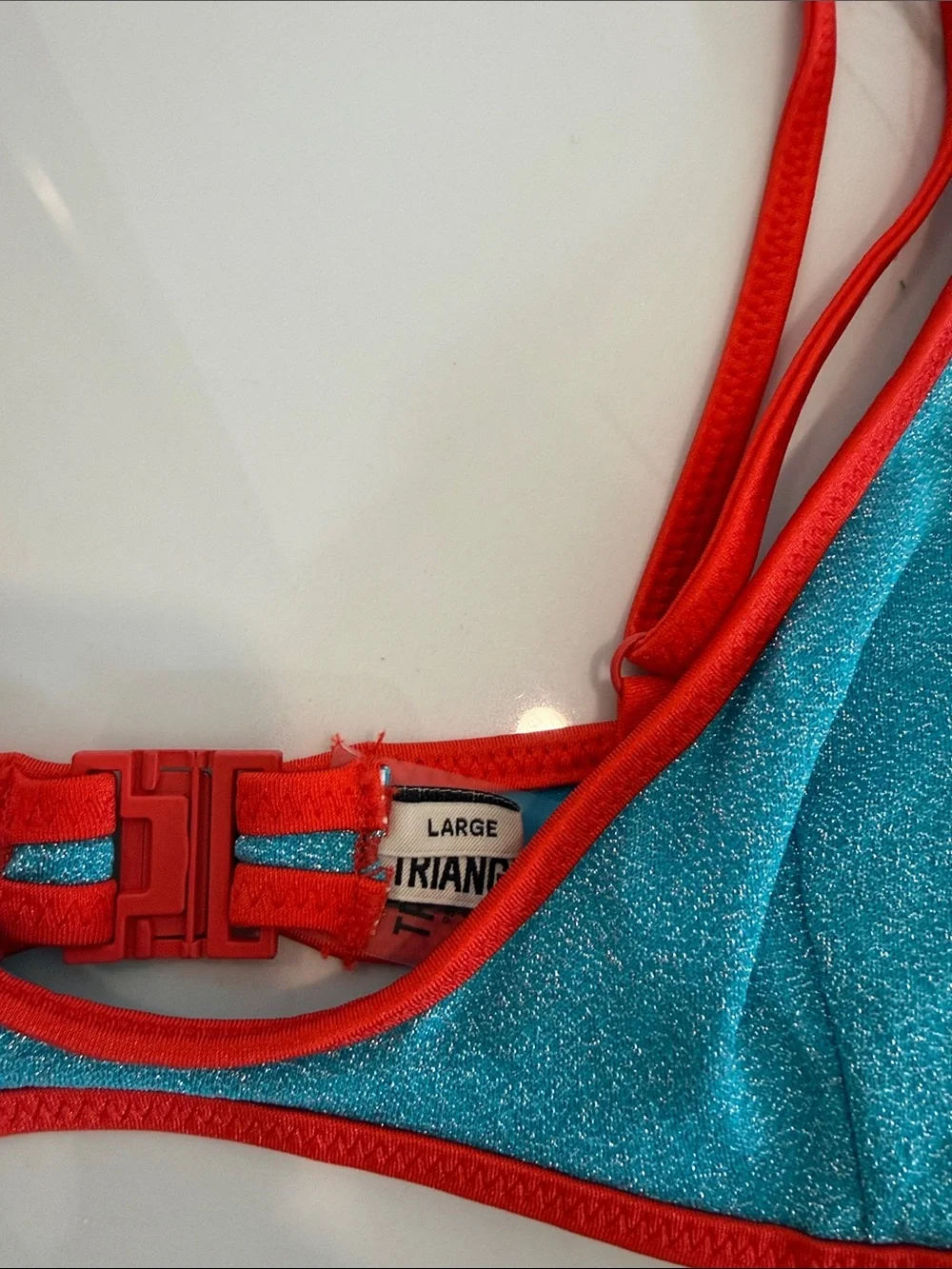 triangl swimwear turquoise bikini with red trim